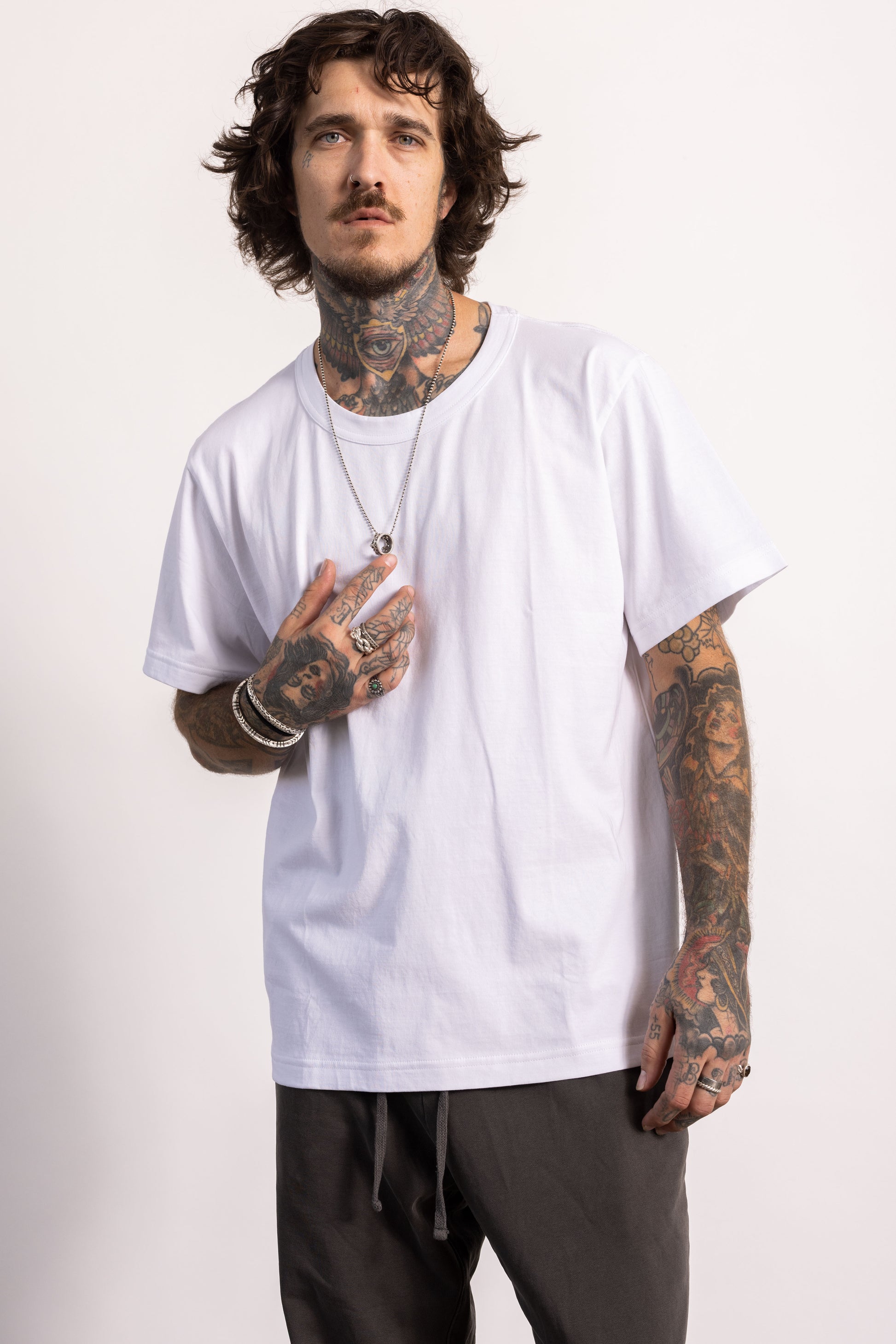 White male model with edgy style wearing a heavyweight pima cotton oversized Boxy T-shirt.