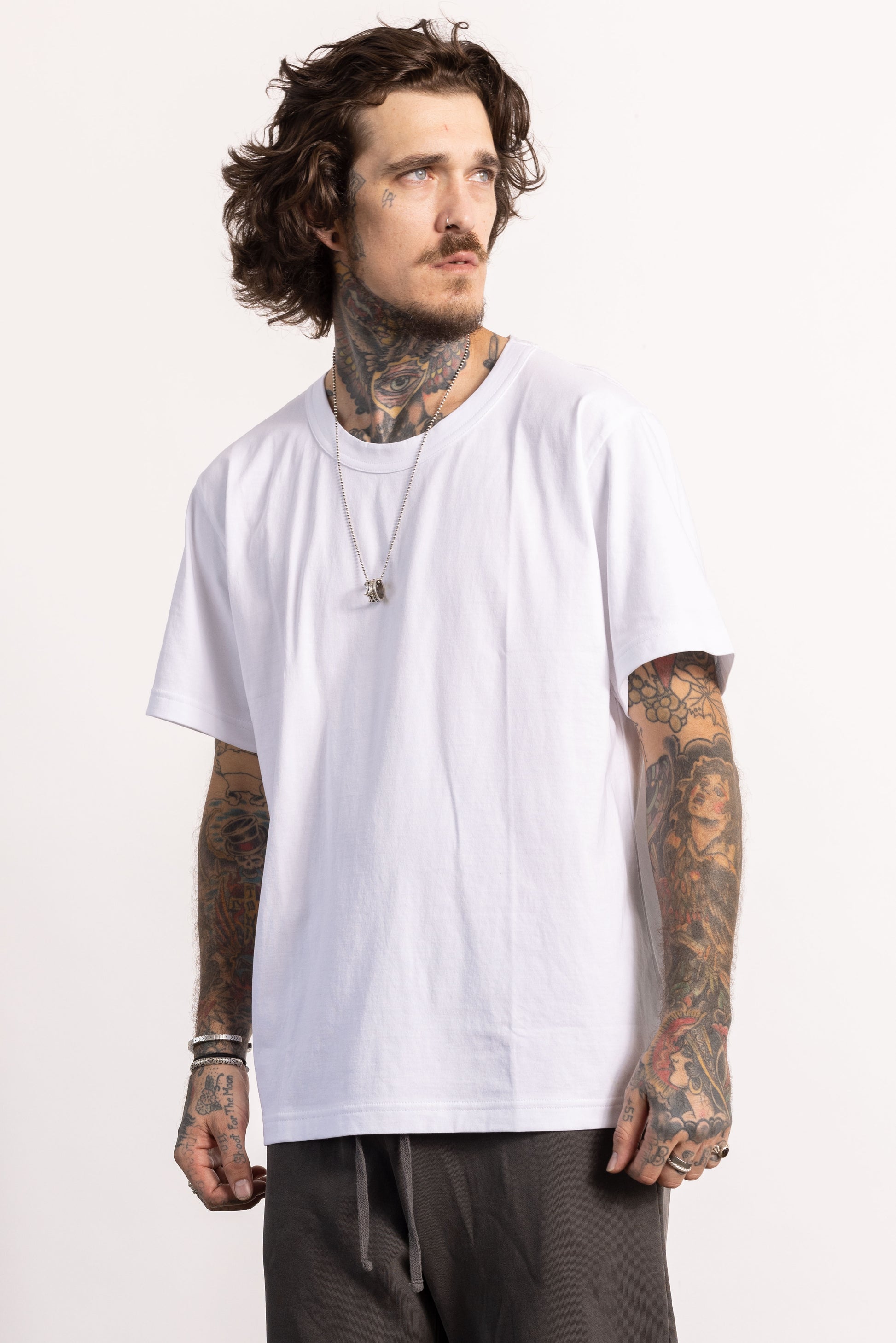 White male model with edgy style wearing a heavyweight pima cotton oversized Boxy T-shirt.