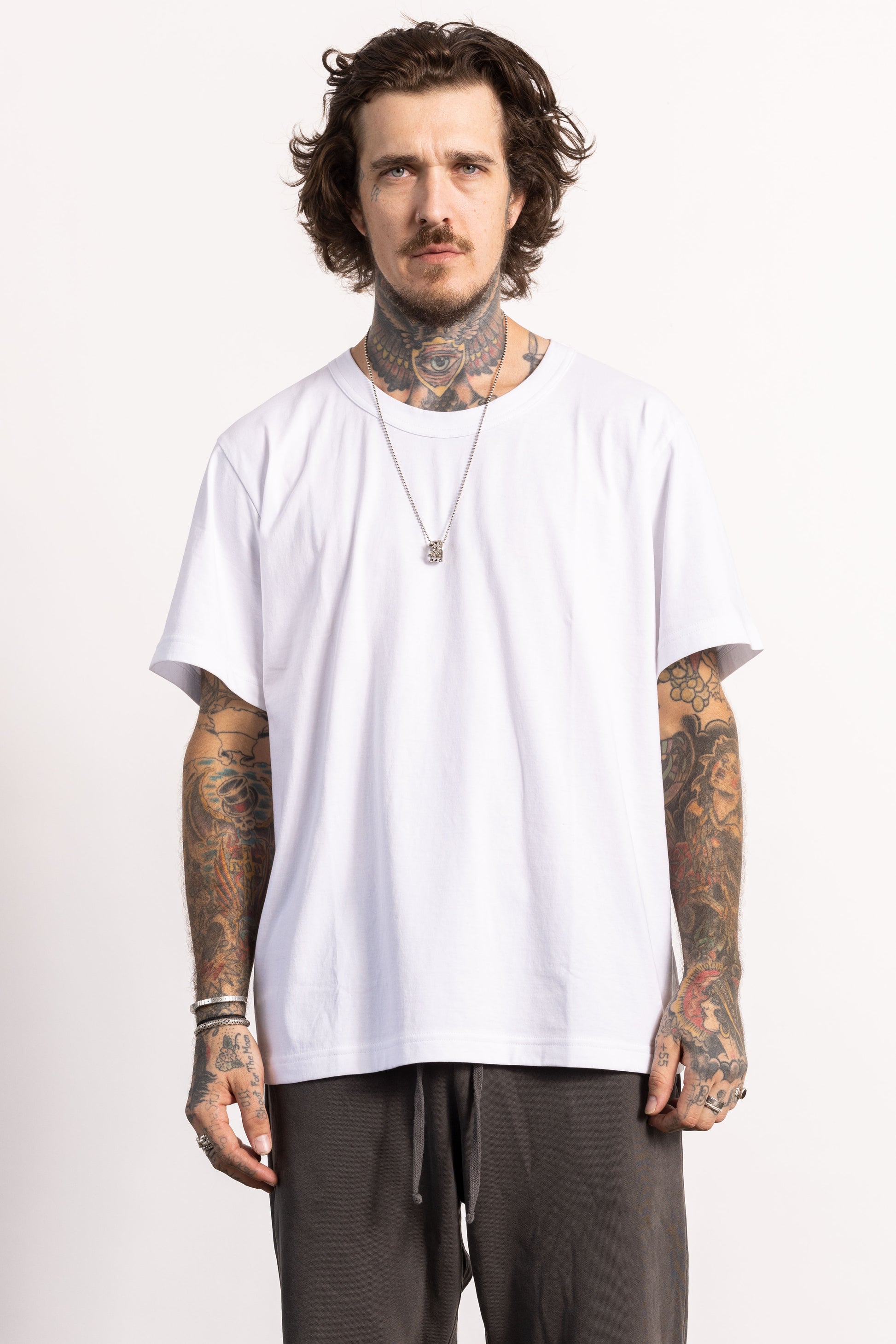 White male model with edgy style wearing a heavyweight pima cotton oversized Boxy T-shirt.