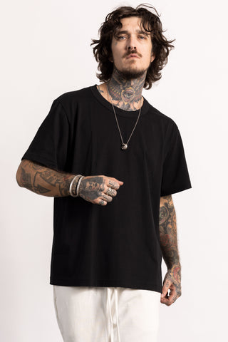 Edgy white Model wearing a Black Pima Cotton Tee