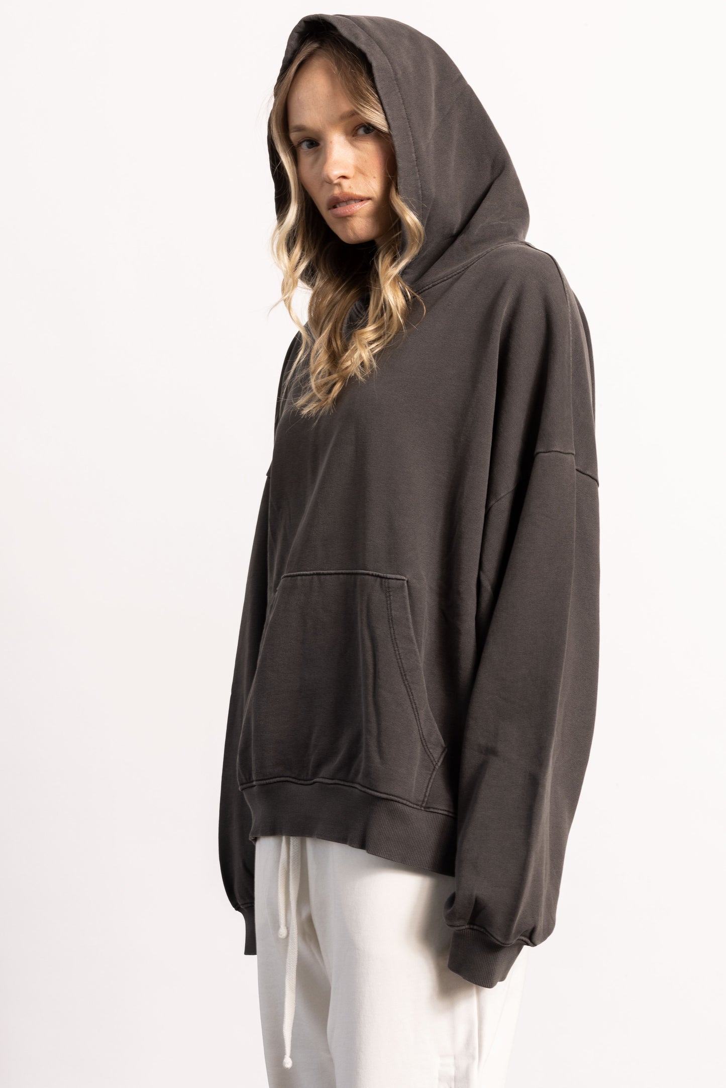 White female model with edgy style wearing a Drop Shoulder Pima Cotton Hoodie